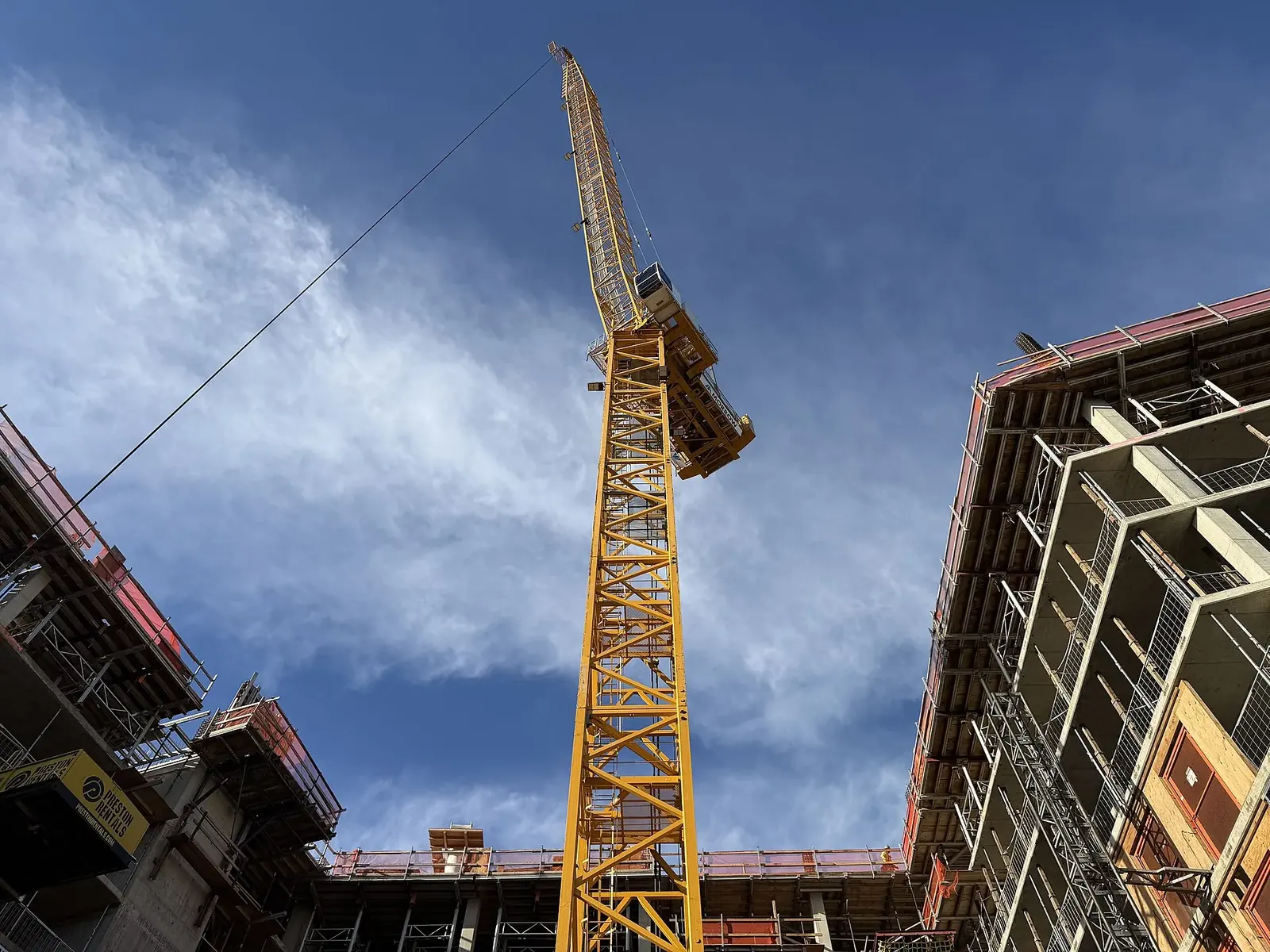 Construction site with structural steel and site coordination underway